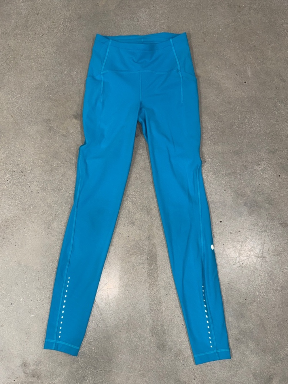 lululemon Teal High-Rise Leggings. Sz 4, with side pockets and back zipper